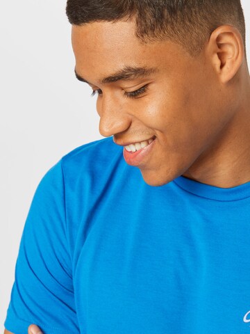 OAKLEY Funkcionalna majica | modra barva