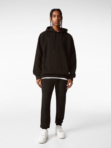 Bershka Tapered Hose in Schwarz