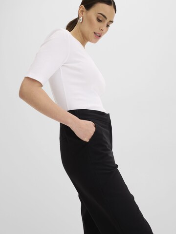 regular Pantaloni di bonprix in nero
