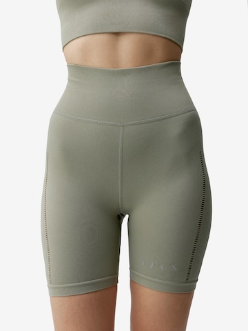 Born Living Yoga Sportbroek 'Sunset' in Groen: voorkant