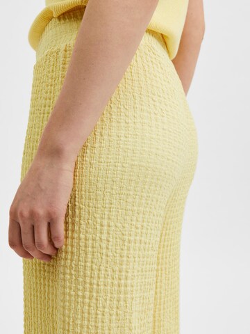 SELECTED FEMME Zvonové kalhoty Kalhoty 'Thea' – žlutá
