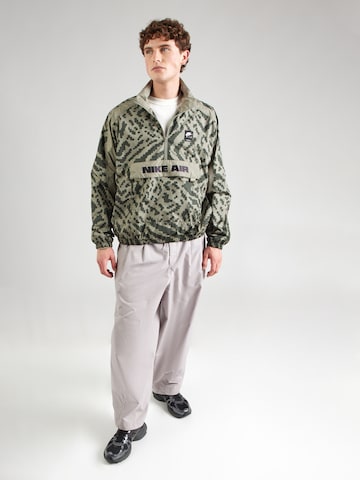 Baggy Pantalon à pince 'CLUB' Nike Sportswear en gris