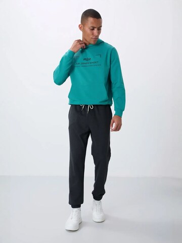 Tapered Pantaloni di Tommy Life in nero