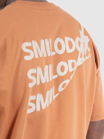 T-Shirt fonctionnel 'Malin' Smilodox en orange
