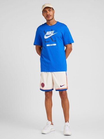 Nike Sportswear - Camisa em azul