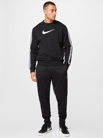 Nike Sportswear Tapered Hose in Schwarz