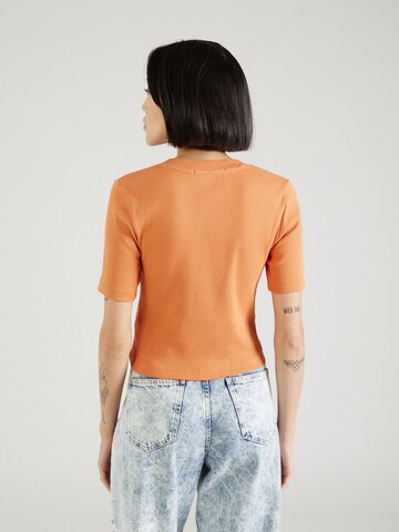 Calvin Klein Jeans Tričko – oranžová