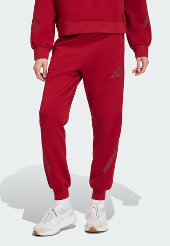ADIDAS SPORTSWEAR Tapered Pants 'Z.N.E' in Red: front