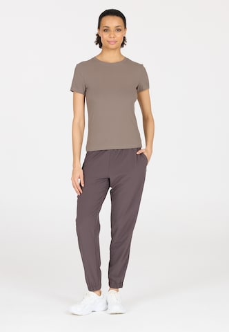 Athlecia Functioneel shirt 'Tinashe' in Bruin