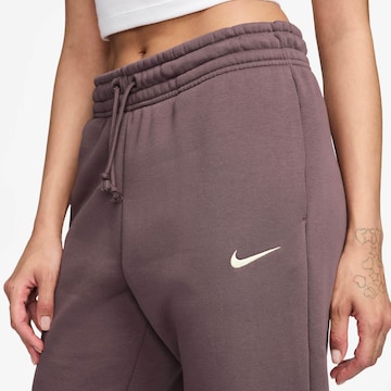 Nike Sportswear Tapered Nadrág 'Phoenix Fleece' - lila