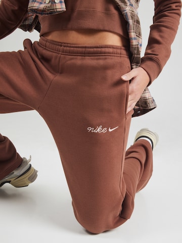 Nike Sportswear Свободный крой Штаны 'PHNX FLC' в Коричневый