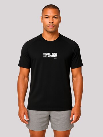 T-Shirt 'Comfort Zones Are Overrated' F4NT4STIC en noir : devant