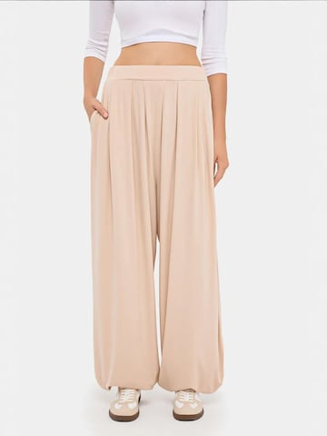 Hiccup - Perna larga Calças harem em bege: frente