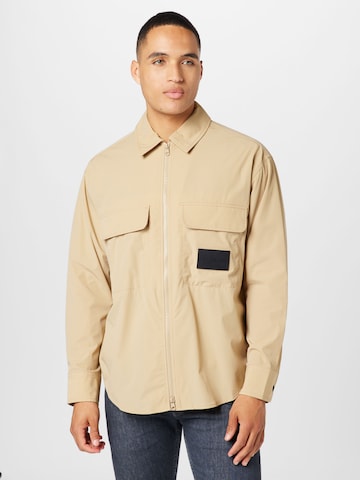 Calvin Klein Jeans Between-season jacket 'ESSENTIAL' in Beige: front