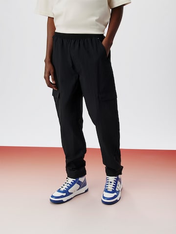 ABOUT YOU x Kingsley Coman Tapered Cargo Pants 'Enzo' in Black: front