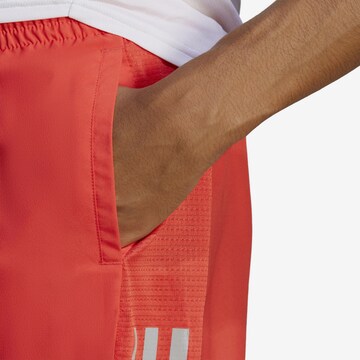 ADIDAS SPORTSWEAR Regular Workout Pants 'OWN THE RUN' in Orange