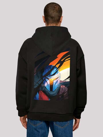 Sweat-shirt 'Star Wars The Mandalorian Glare' F4NT4STIC en noir : devant