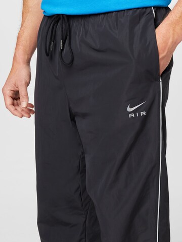 Nike Sportswear Regular Trousers in Black