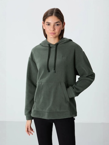 Sweat-shirt Tommy Life en vert : devant