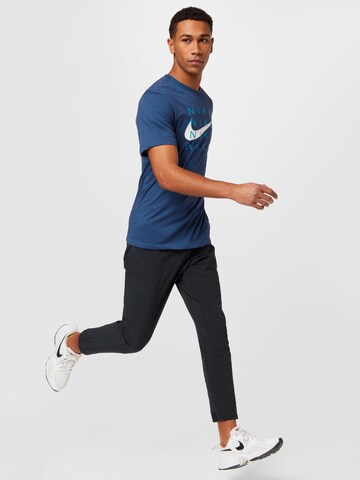 NIKE - Camiseta funcional en azul