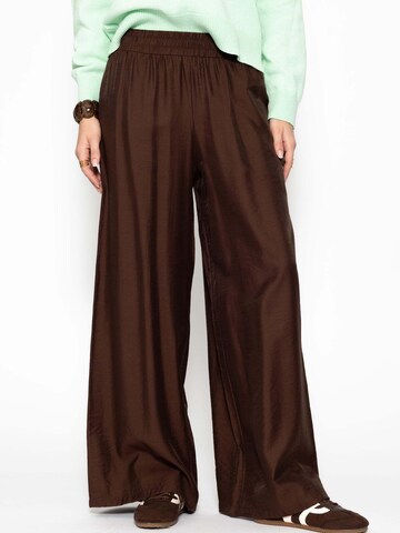 SASSYCLASSY Loose fit Trousers in Brown