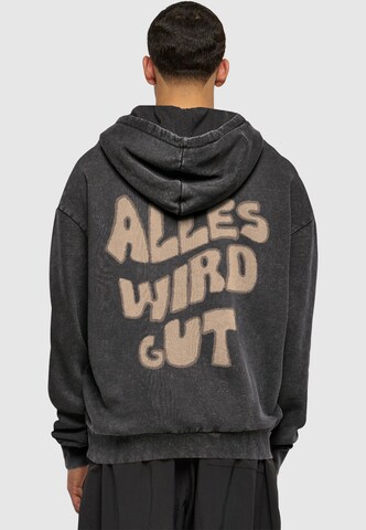 Merchcode Sweatshirt 'Alles Wird Gut' in Zwart: voorkant