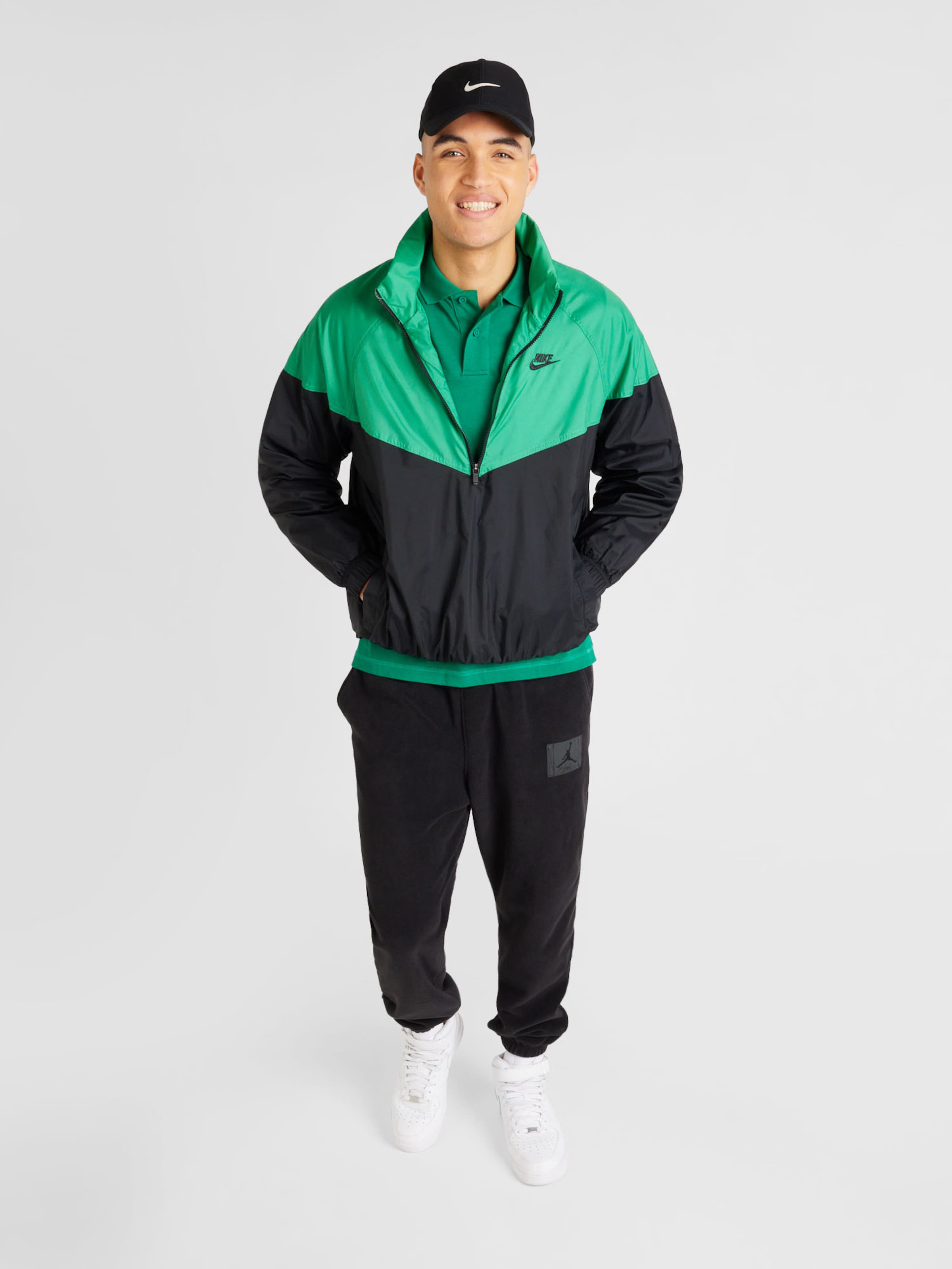Green and black nike windbreaker sale