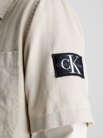 Calvin Klein Jeans Regular fit Button Up Shirt in Beige