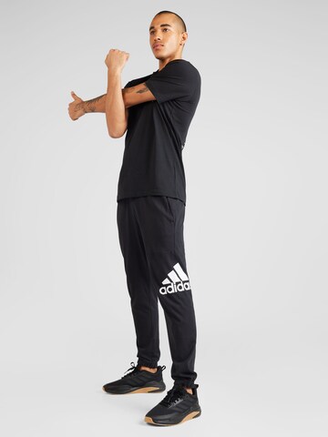 ADIDAS SPORTSWEAR Tapered Workout Pants 'ESS' in Black