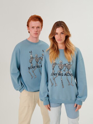 ABOUT YOU x Swalina&Linus Sweatshirt 'Hamza' i blå