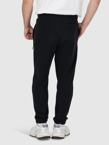 Sergio Tacchini Loosefit Sporthose 'Oreste' in Schwarz