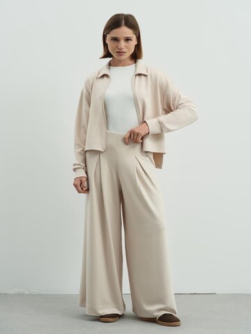 C&City Wide leg Pleat-front trousers in Beige