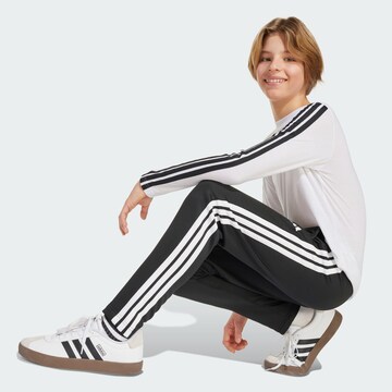 ADIDAS SPORTSWEAR - regular Pantalón deportivo en negro