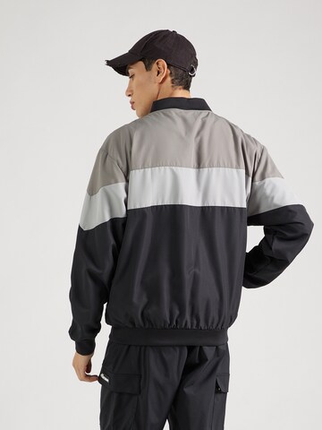 ELLESSE Between-season jacket 'Brolo' in Grey