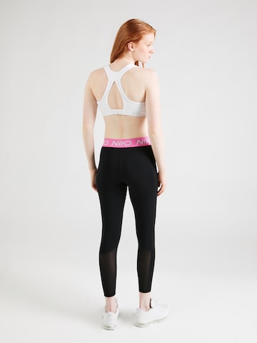 Skinny Pantalon de sport 'NP 365' NIKE en noir