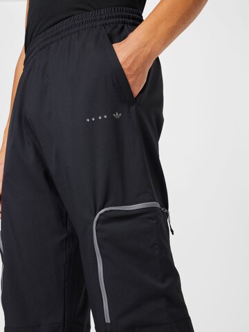 Effilé Pantalon cargo 'Reclaim ' ADIDAS ORIGINALS en noir