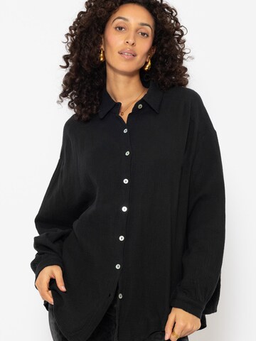 SASSYCLASSY Bluse 'kürzere Variante' in Schwarz