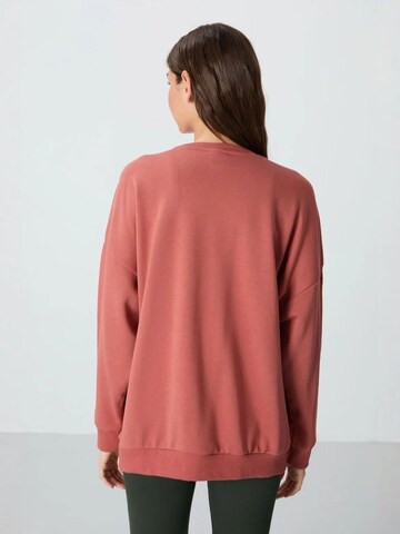 Sweat-shirt Tommy Life en rouge