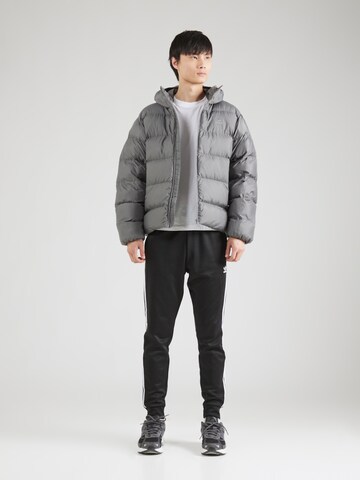 ADIDAS ORIGINALS Tussenjas in Grijs
