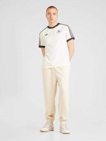 Tapered Pantaloni de la Champion Authentic Athletic Apparel pe bej