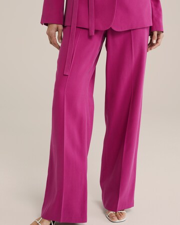 WE Fashion Loose fit Trousers with creases in Purple: front