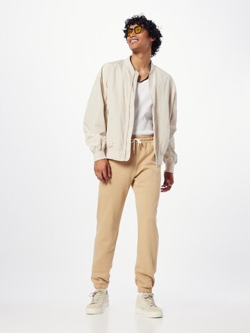 SCOTCH & SODA Tapered Broek in Bruin