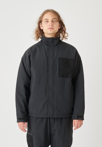 Cleptomanicx Winter Jacket 'Square' in Black: front