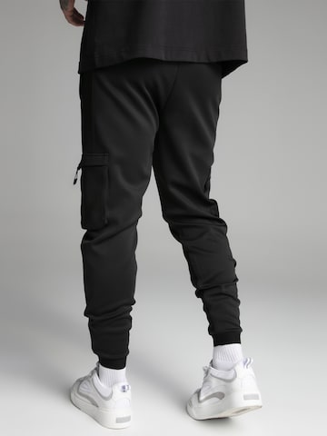 Tapered Pantaloni di SikSilk in nero