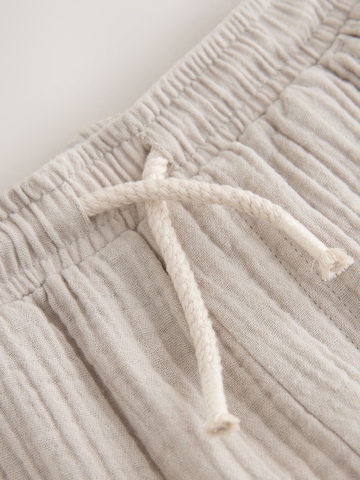 Next Normální Kalhoty – béžová