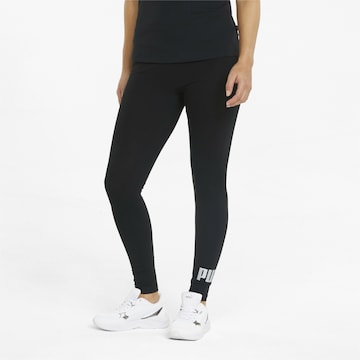 PUMA Skinny Workout Pants in Black: front