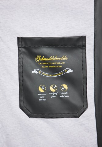 Schmuddelwedda - Sobretudo funcionais em preto