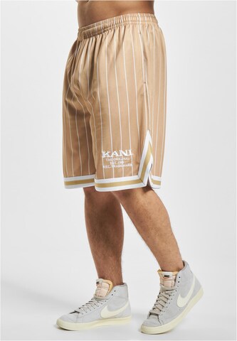 Karl Kani Loose fit Trousers in Beige