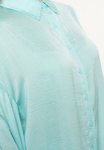 SANIKA - Blusa em azul