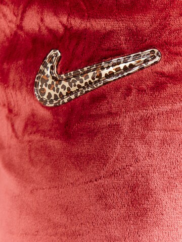 Nike Sportswear Regular Housut värissä oranssi